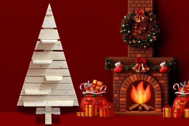 Grand sapin bois en planches recyclées, décoration de Noël écologique et naturelle, placé à côté d’une cheminée et de cadeaux festifs